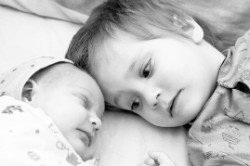 http://www.dreamstime.com/royalty-free-stock-photo-toddler-boy-his-newborn-sister-image22616395